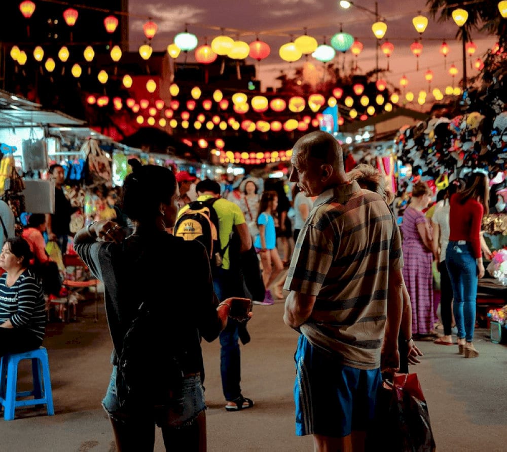 The sparkling lights in the souvenir area create a perfect backdrop for photos